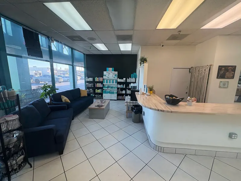 Bright commercial lobby with reception counter and seating area