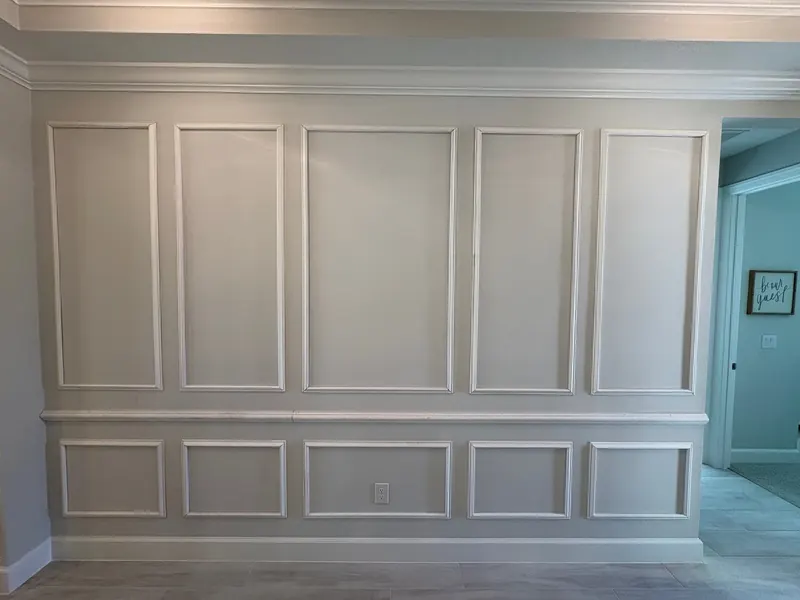 Full accent wall with two rows of trim-box wainscoting